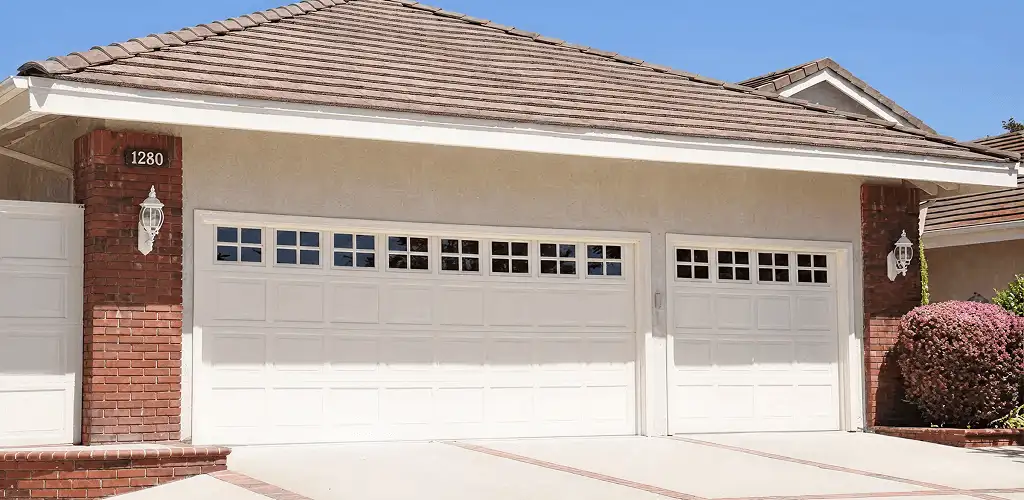 Residential garage door repair service for a double garage door in Toledo, OH
