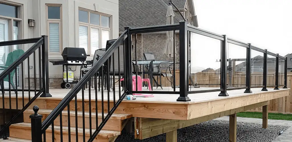 Handrail installation on a deck staircase for safety and code compliance in Toledo, OH